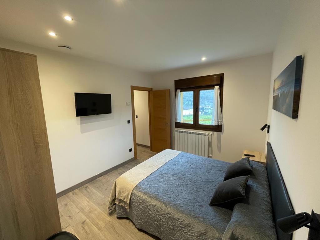 Apartamentos Fuente La Pipa Avín Esterno foto